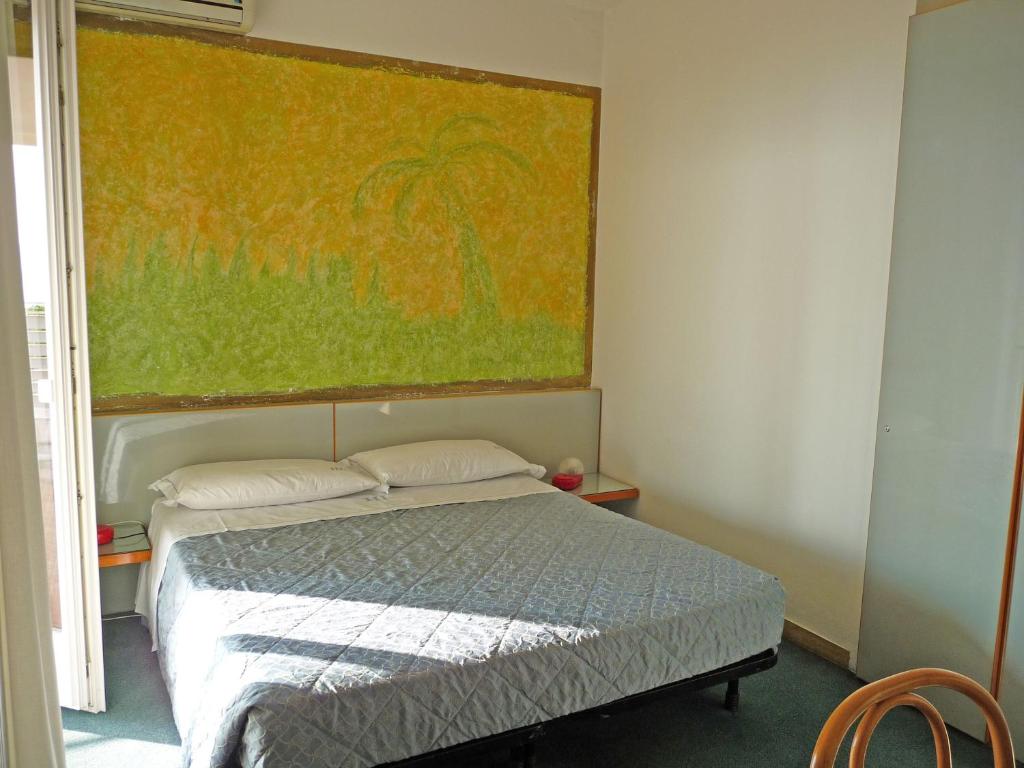 Postel nebo postele na pokoji v ubytování Hotel Luna