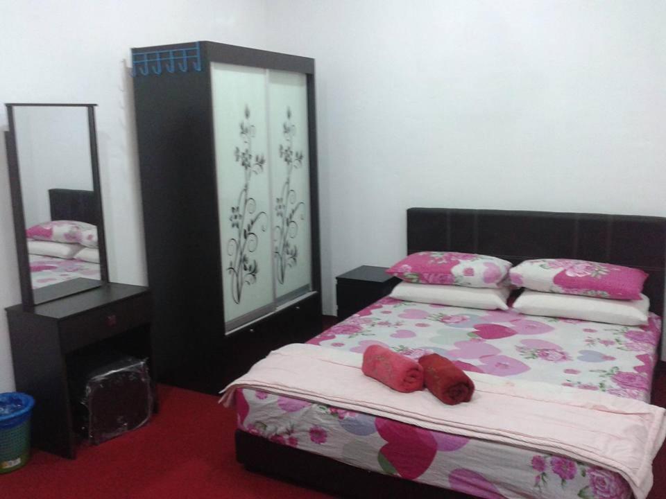 Katil atau katil-katil dalam bilik di NUE Guesthouse
