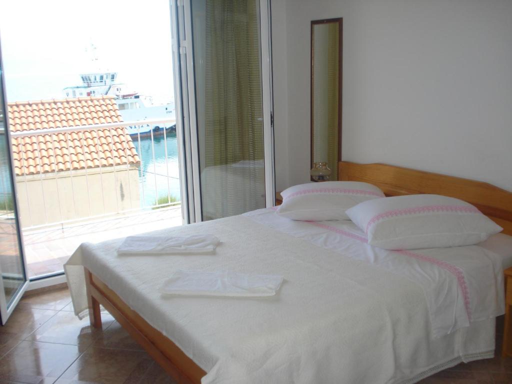 Posteľ alebo postele v izbe v ubytovaní Apartments San Giorgio
