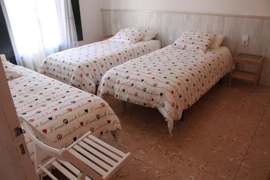 Postel nebo postele na pokoji v ubytování Son Quimet