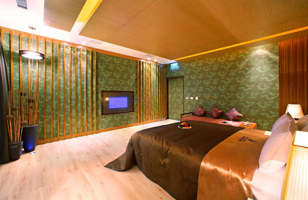 TV a/nebo společenská místnost v ubytování Le chateau Motel