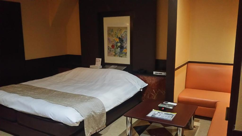 Postel nebo postele na pokoji v ubytování Hotel Sting