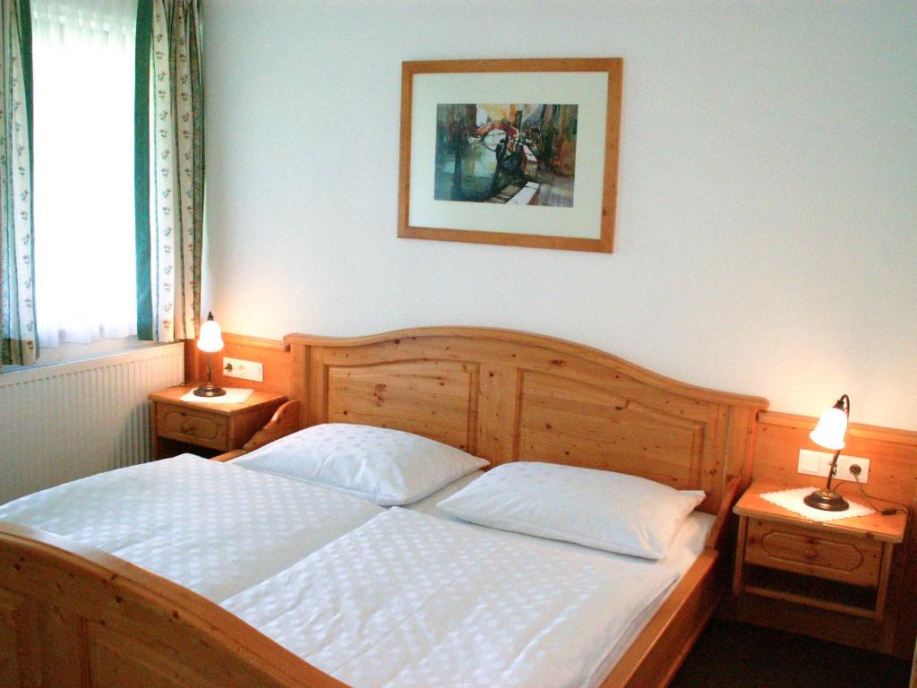 Postel nebo postele na pokoji v ubytování Das kleine Berghotel