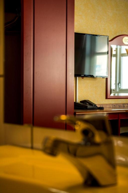 a blurry picture of a sink in a room at Tysfjord Hotel in Storjord I Tysfjord