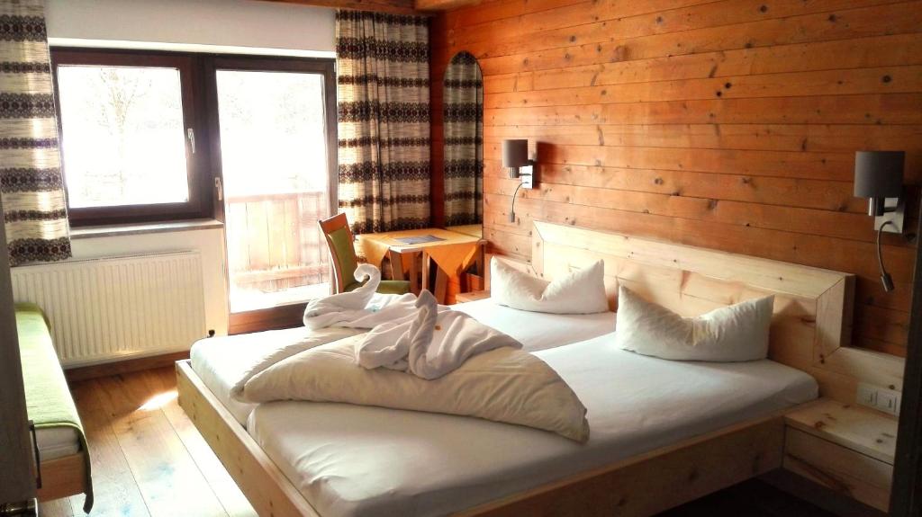 Posteľ alebo postele v izbe v ubytovaní Hotel Gut Kramerhof