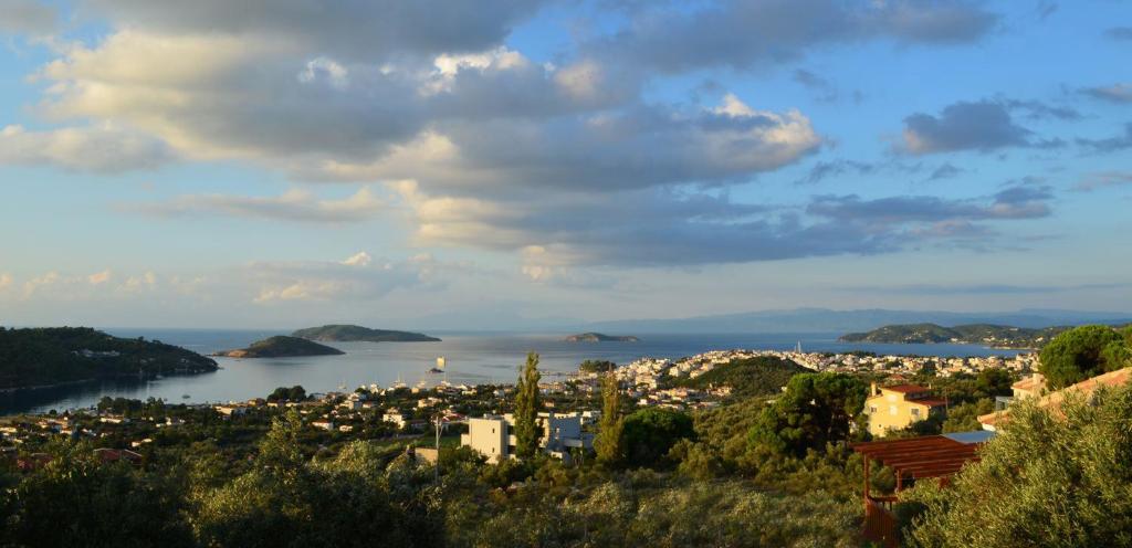 a view of a city and a body of water at Villas Zoe in Skiathos