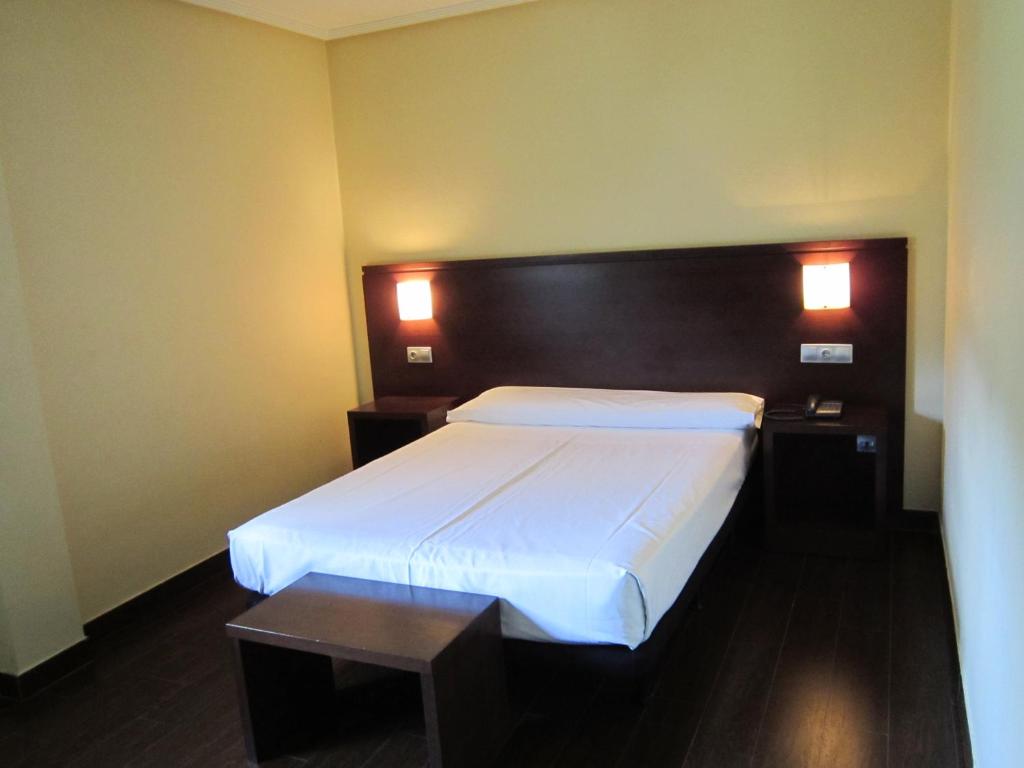 Postel nebo postele na pokoji v ubytování Euba Hotel