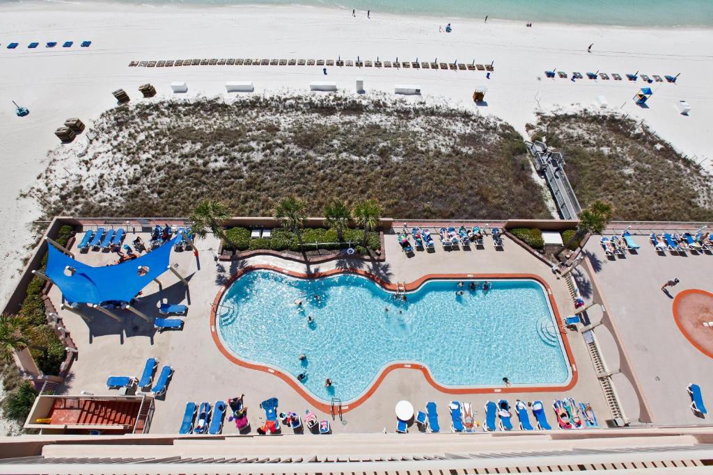 an overhead view of a pool at a resort at Sunrise Beach by Panhandle Getaways in Panama City Beach