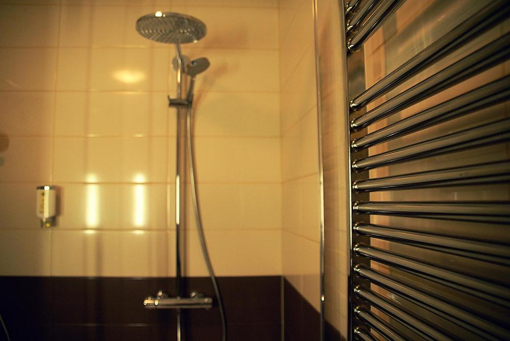 Koupelna v ubytování Hotel Opara