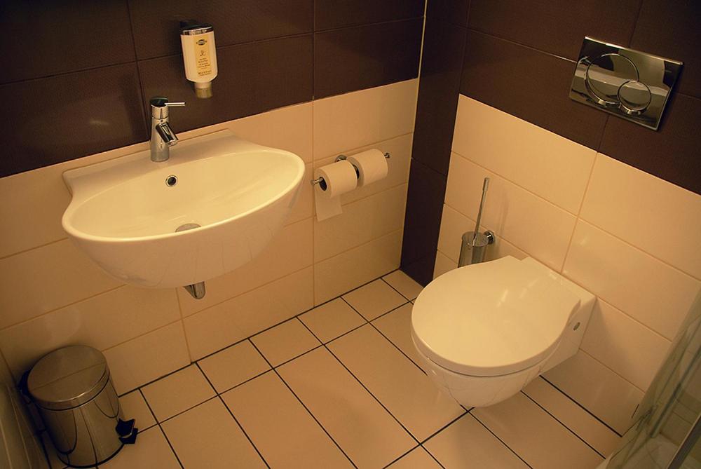 Koupelna v ubytování Hotel Opara