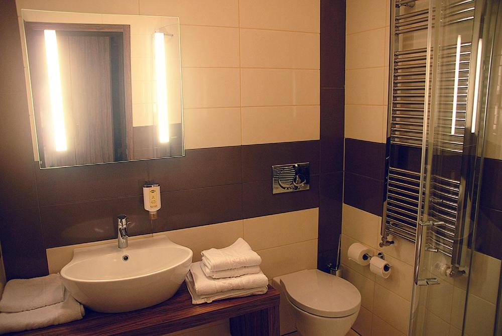 Koupelna v ubytování Hotel Opara