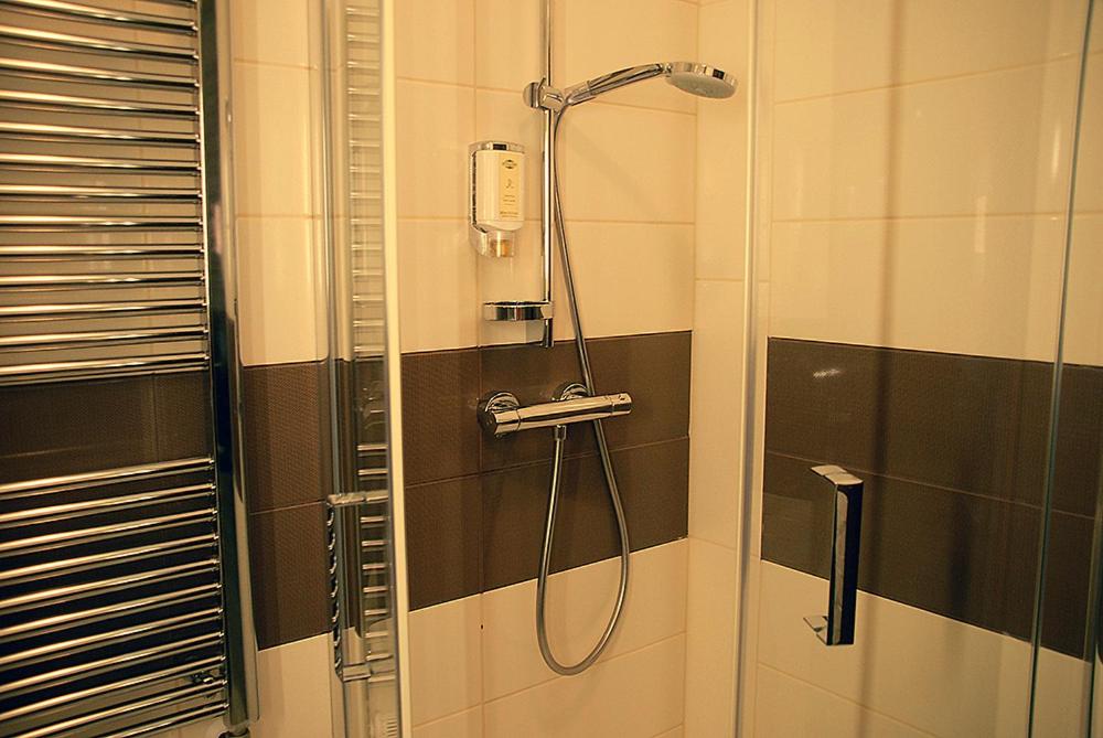 Koupelna v ubytování Hotel Opara