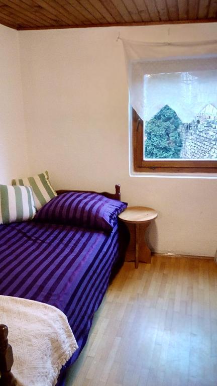Postel nebo postele na pokoji v ubytování Guesthouse Nina