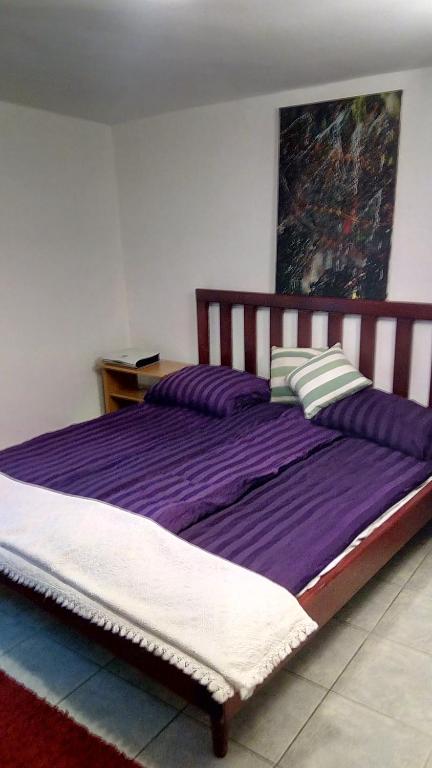Postel nebo postele na pokoji v ubytování Guesthouse Nina