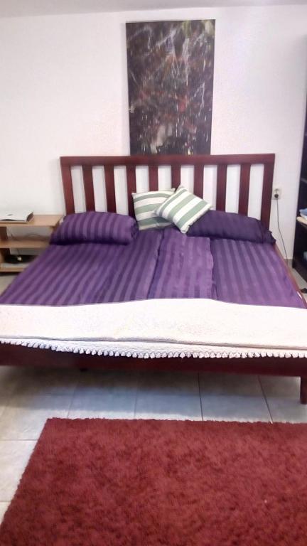 Postel nebo postele na pokoji v ubytování Guesthouse Nina