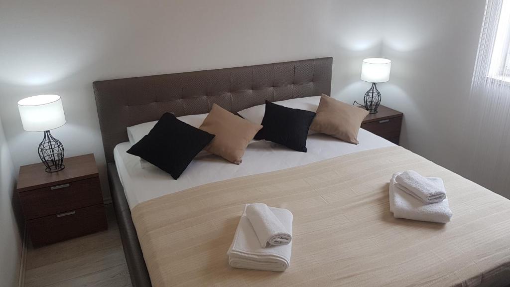 Postel nebo postele na pokoji v ubytování Apartment Azaleja