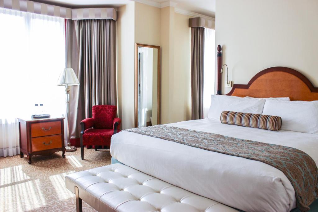 Postel nebo postele na pokoji v ubytování Hotel Providence