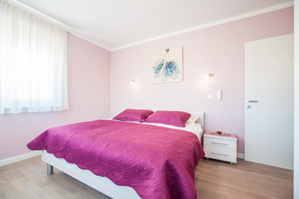 Posteľ alebo postele v izbe v ubytovaní Apartment Tajana Residence