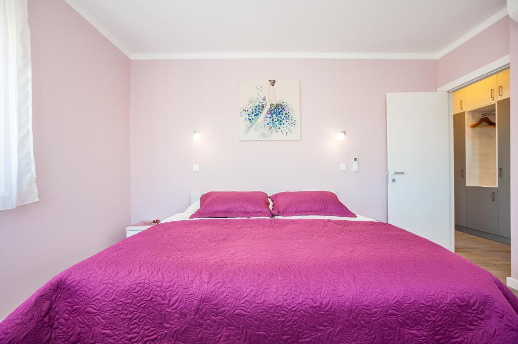 Posteľ alebo postele v izbe v ubytovaní Apartment Tajana Residence