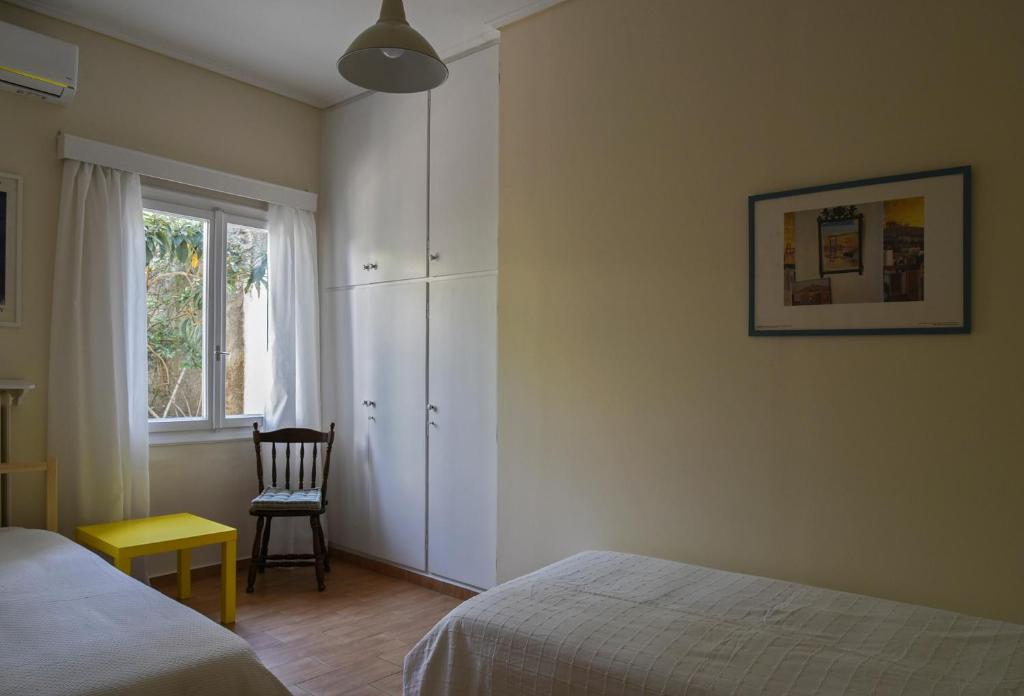 Posteľ alebo postele v izbe v ubytovaní Miranda's Apartment in Thissio