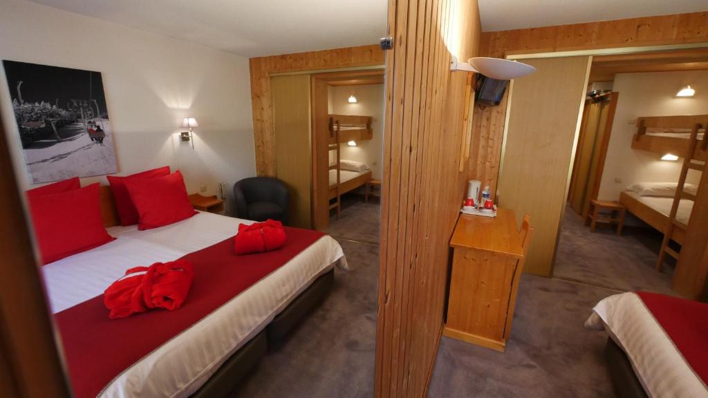 Postel nebo postele na pokoji v ubytování Hotel Bel'alpe