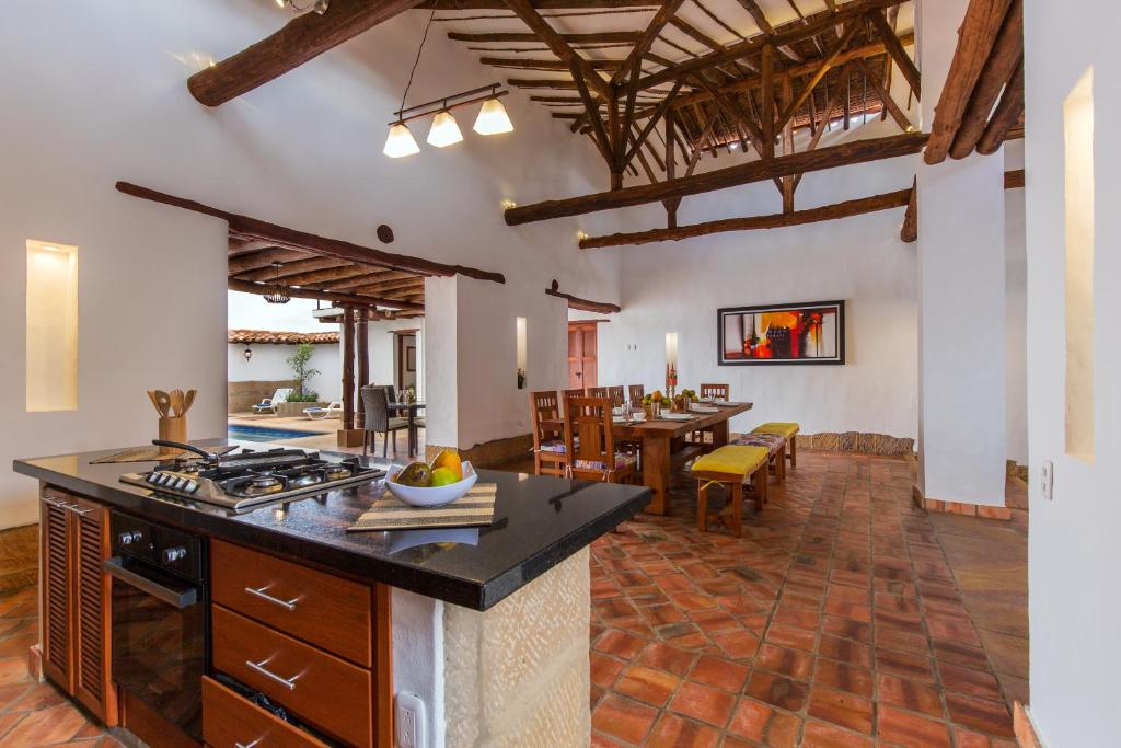 Kuchyň nebo kuchyňský kout v ubytování Casa Bari El Jardin