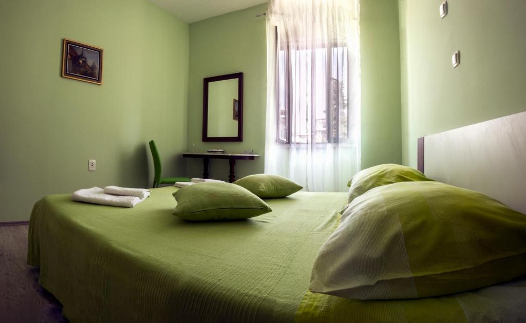 Posteľ alebo postele v izbe v ubytovaní Pavelin apartments