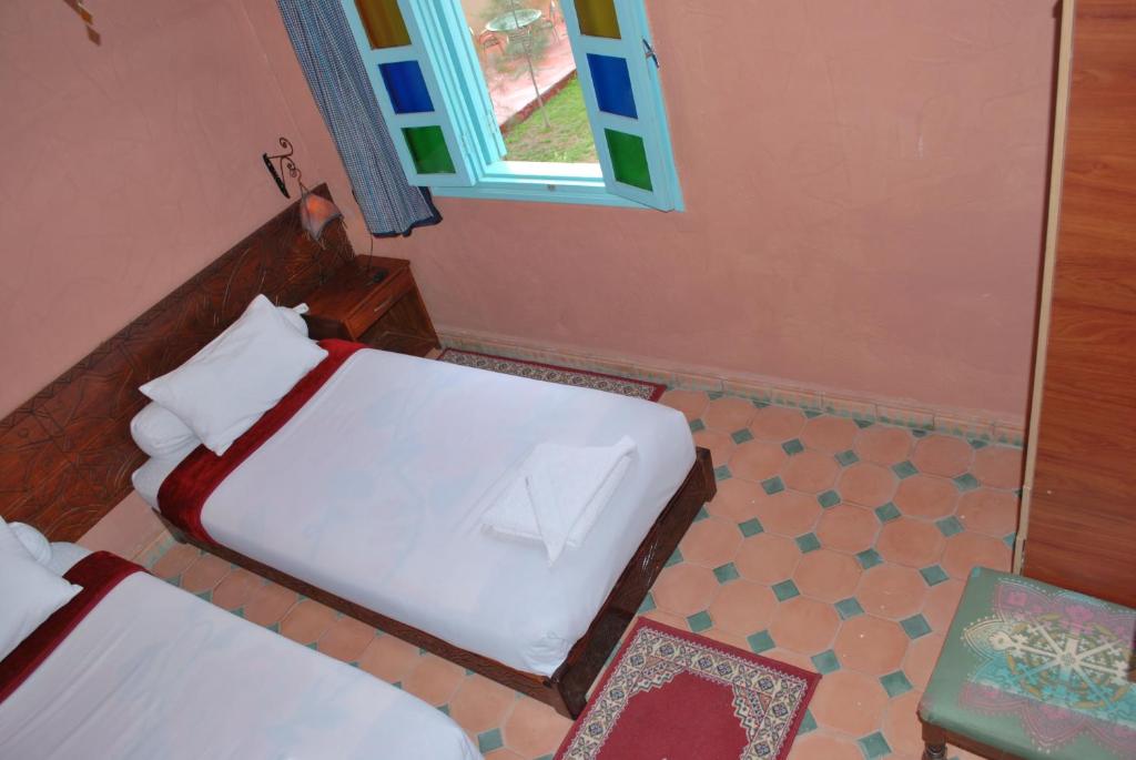 Postel nebo postele na pokoji v ubytování Gite Souss