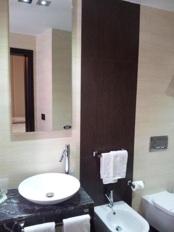Koupelna v ubytování Hotel Excelsior