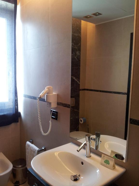 Koupelna v ubytování Hotel Excelsior