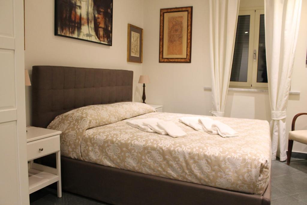 Łóżko lub łóżka w pokoju w obiekcie Villa Abbamer