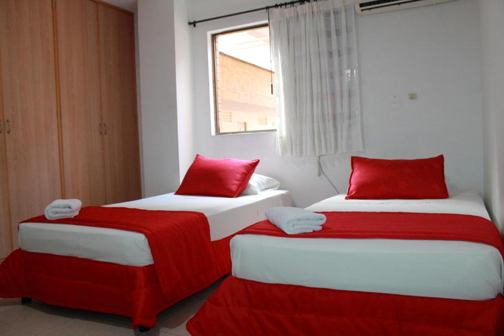 Postel nebo postele na pokoji v ubytování Apartahotel Los Cerezos