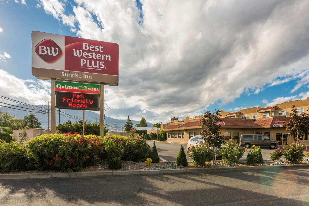 a best western plus sign in front of a hotel at Best Western Plus Osoyoos Hotel & Suites in Osoyoos