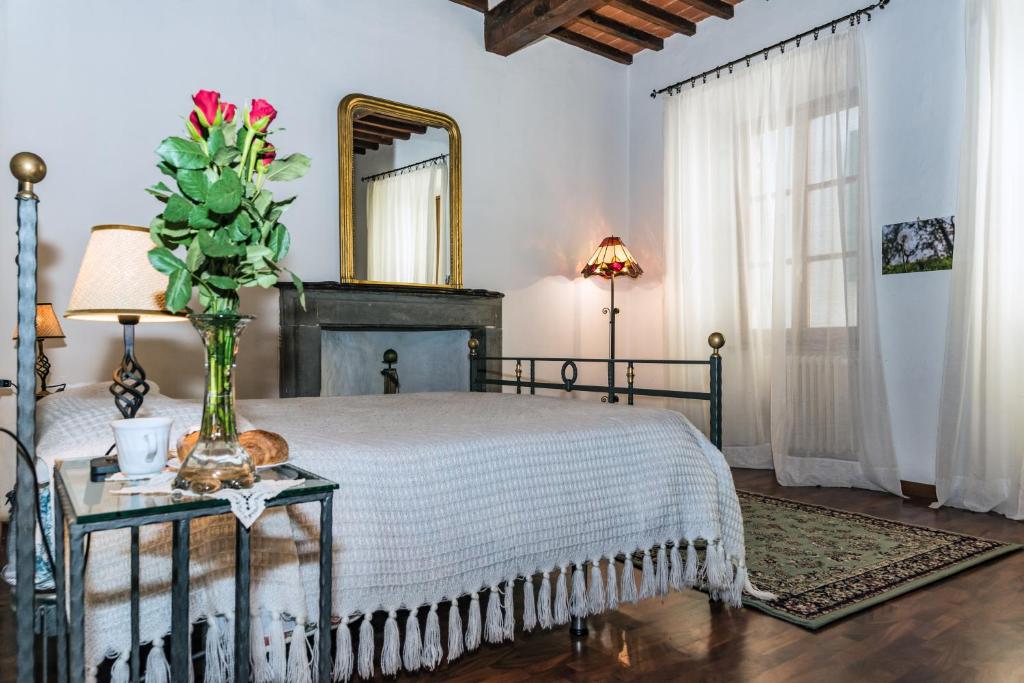 Rooms San Giulianoにあるベッド