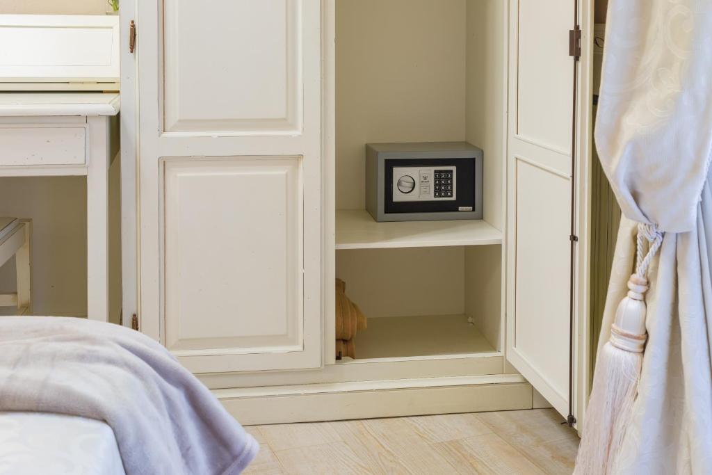 TV a/nebo společenská místnost v ubytování Vecchia Verona Rooms & Apartments