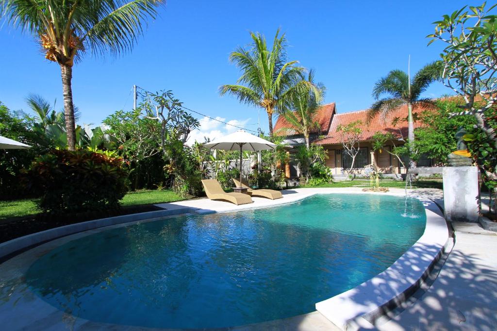 Bazén v ubytování Baliwid Villa Ubud nebo v jeho okolí