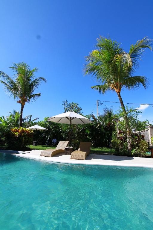Bazén v ubytování Baliwid Villa Ubud nebo v jeho okolí