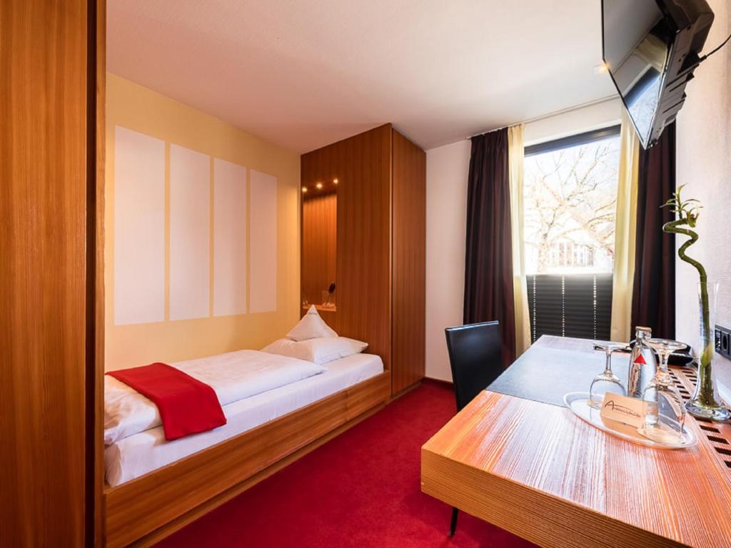 Postel nebo postele na pokoji v ubytování Hotel Antoniushütte