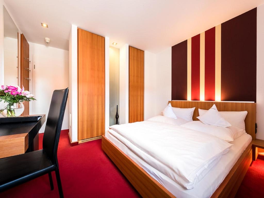 Postel nebo postele na pokoji v ubytování Hotel Antoniushütte