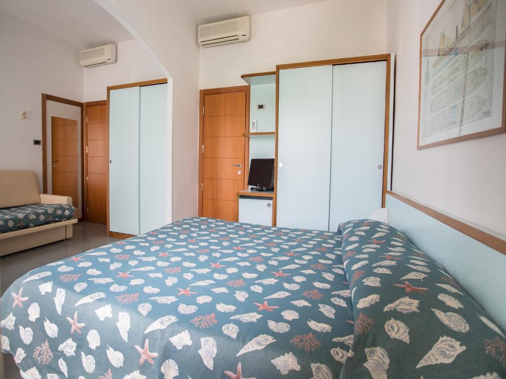 Postel nebo postele na pokoji v ubytování Hotel Gaby