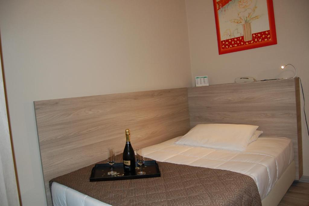 Postel nebo postele na pokoji v ubytování Hotel Citta'