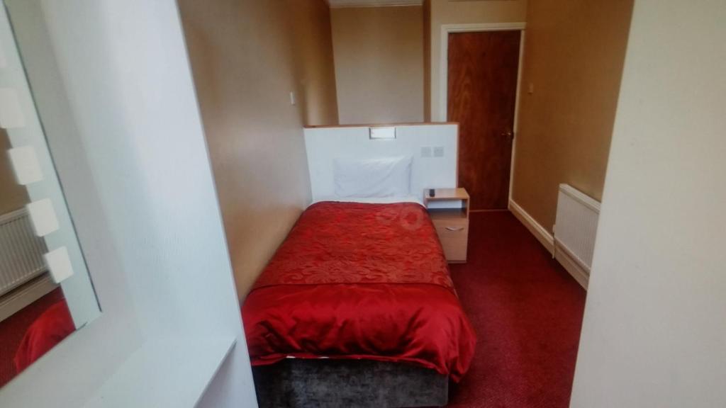Postel nebo postele na pokoji v ubytování Parkway Guesthouse