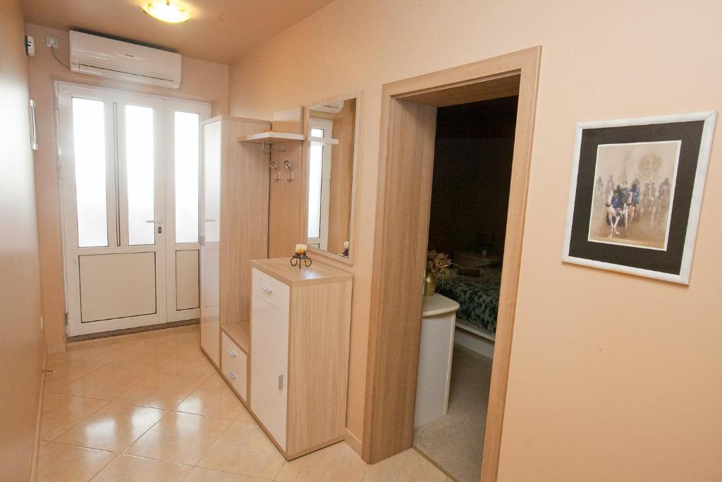 Kuchyň nebo kuchyňský kout v ubytování Apartment Lilly