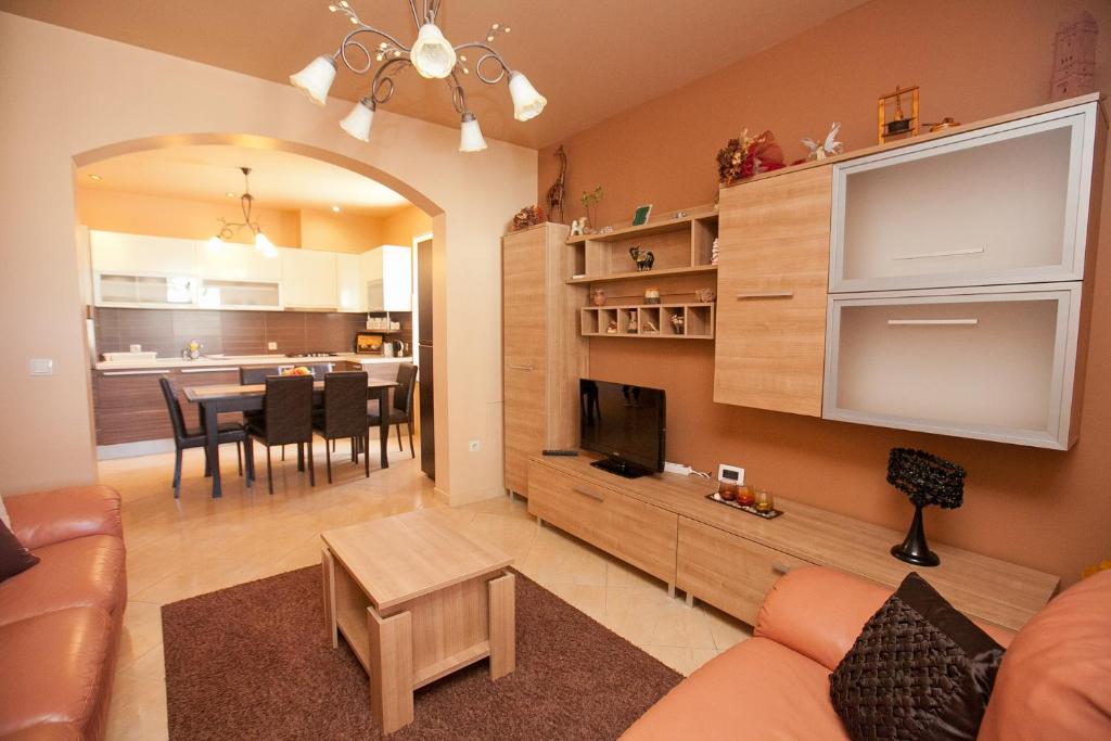 TV a/nebo společenská místnost v ubytování Apartment Lilly