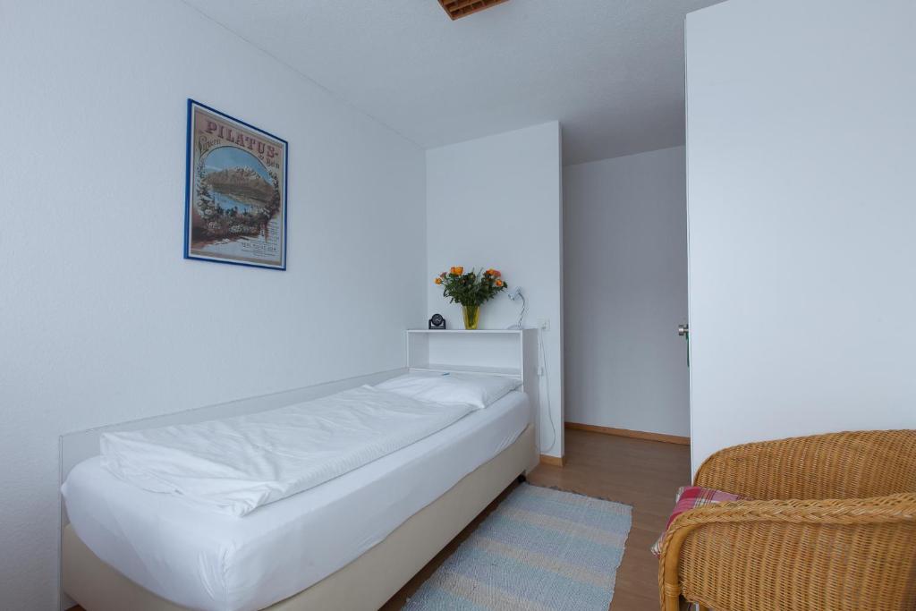 Postel nebo postele na pokoji v ubytování Hotel Alpha