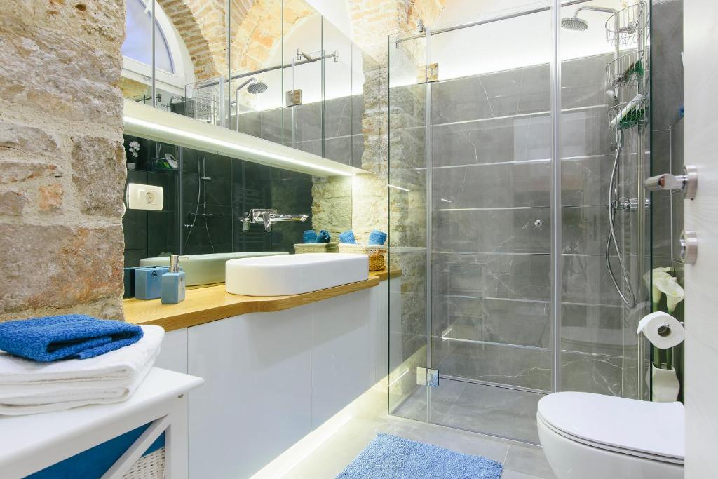 Kúpeľňa v ubytovaní Dalti Center Apartment