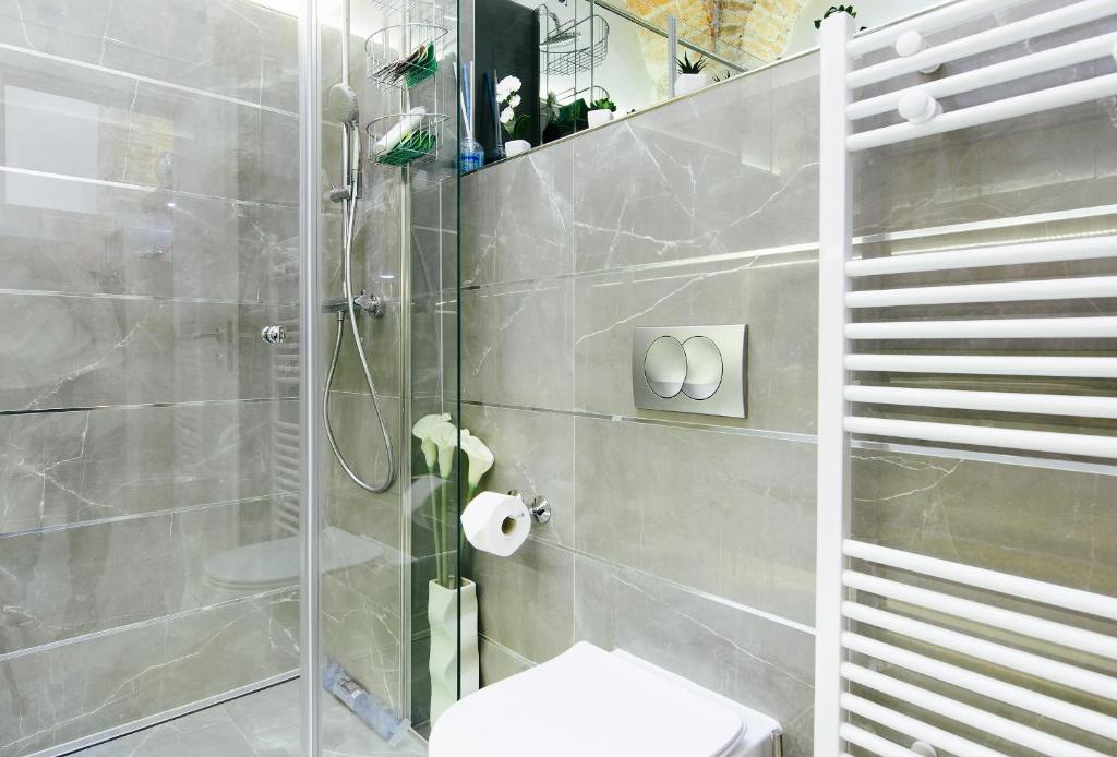 Kúpeľňa v ubytovaní Dalti Center Apartment