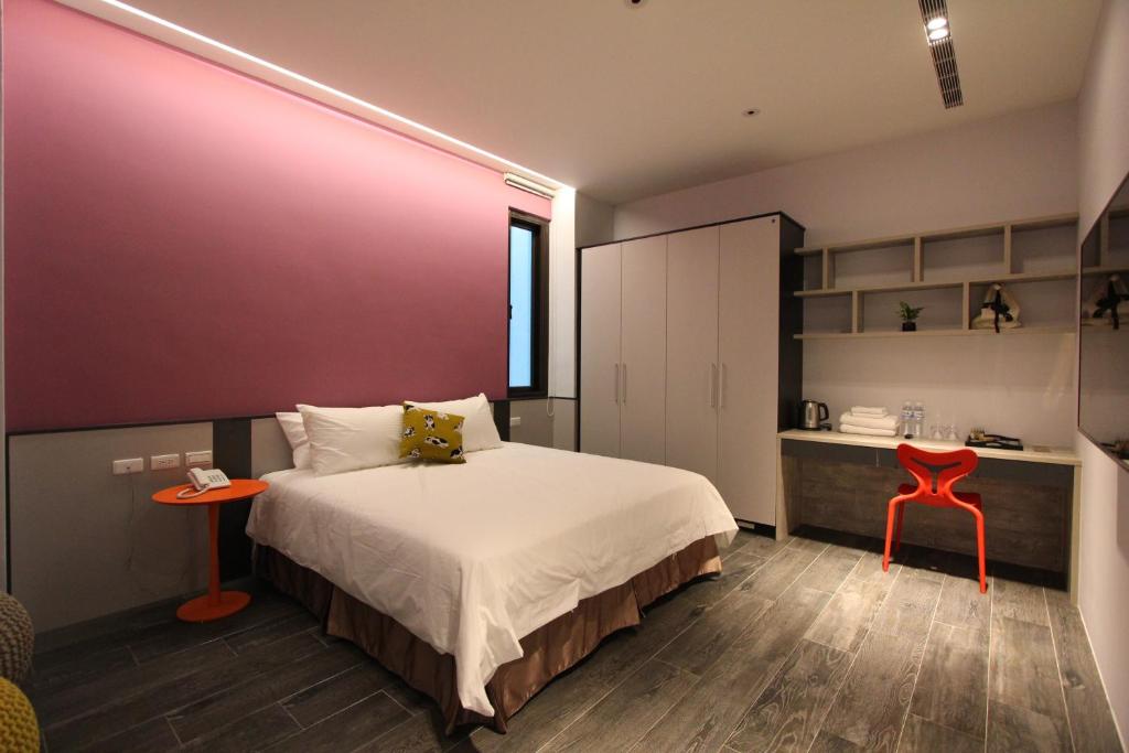 Postel nebo postele na pokoji v ubytování Funson Hotel