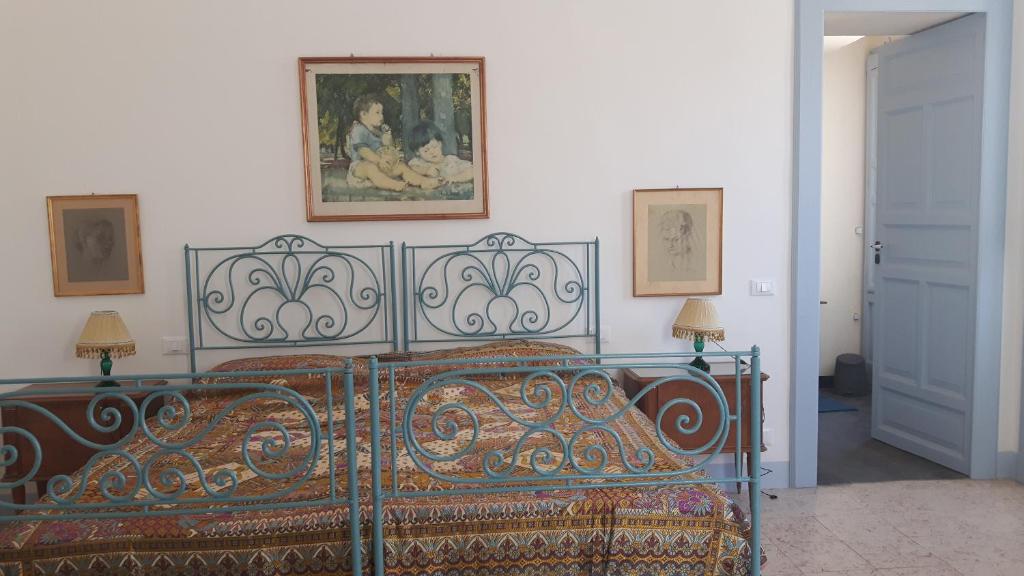 Postel nebo postele na pokoji v ubytování Casa Maltese ri Scicli