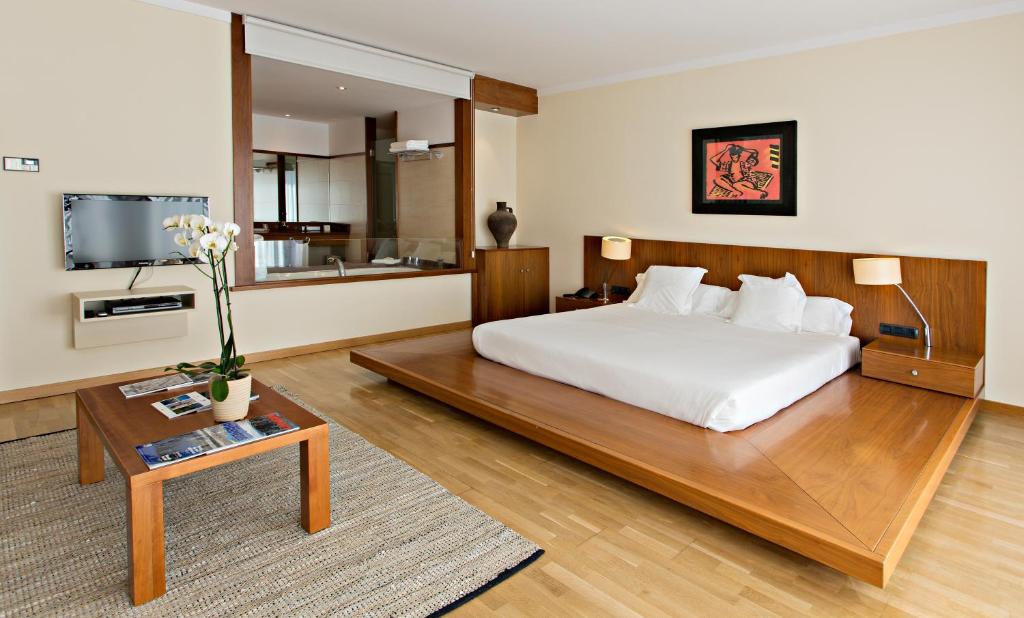 Postel nebo postele na pokoji v ubytování Hotel Can Xiquet